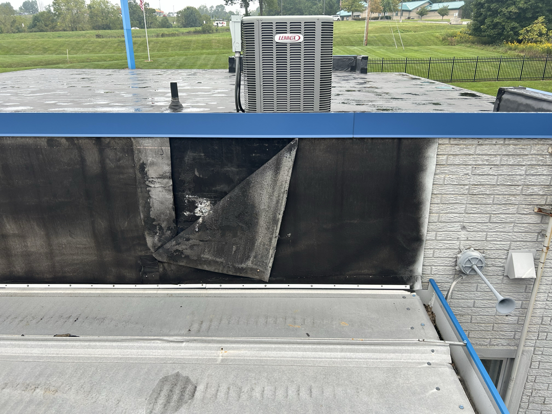 Self-storage facility roofline and gutter system cleaned by Elite Guard Power Washing
