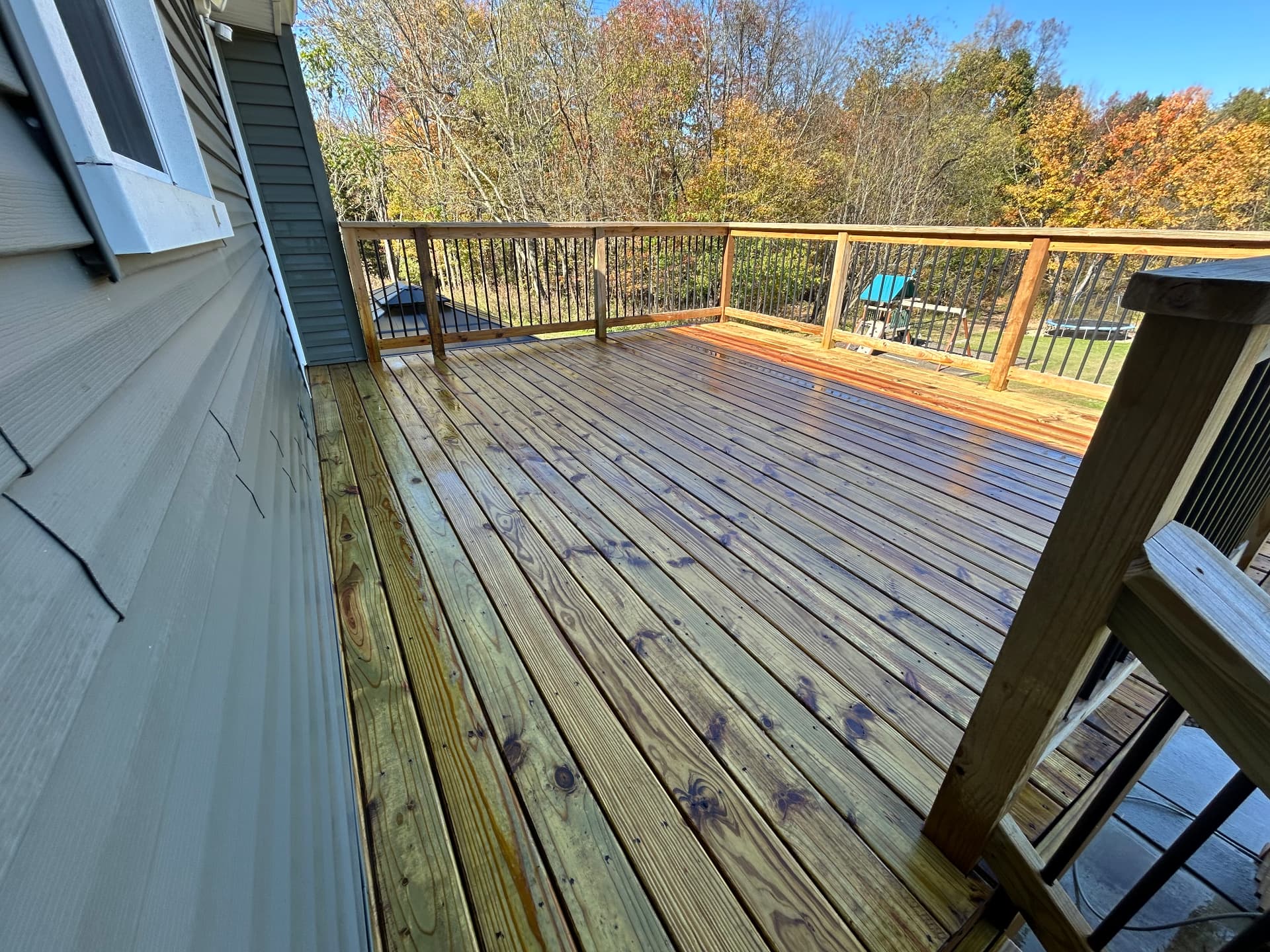 After — Alex’s deck following cleaning and stain removal