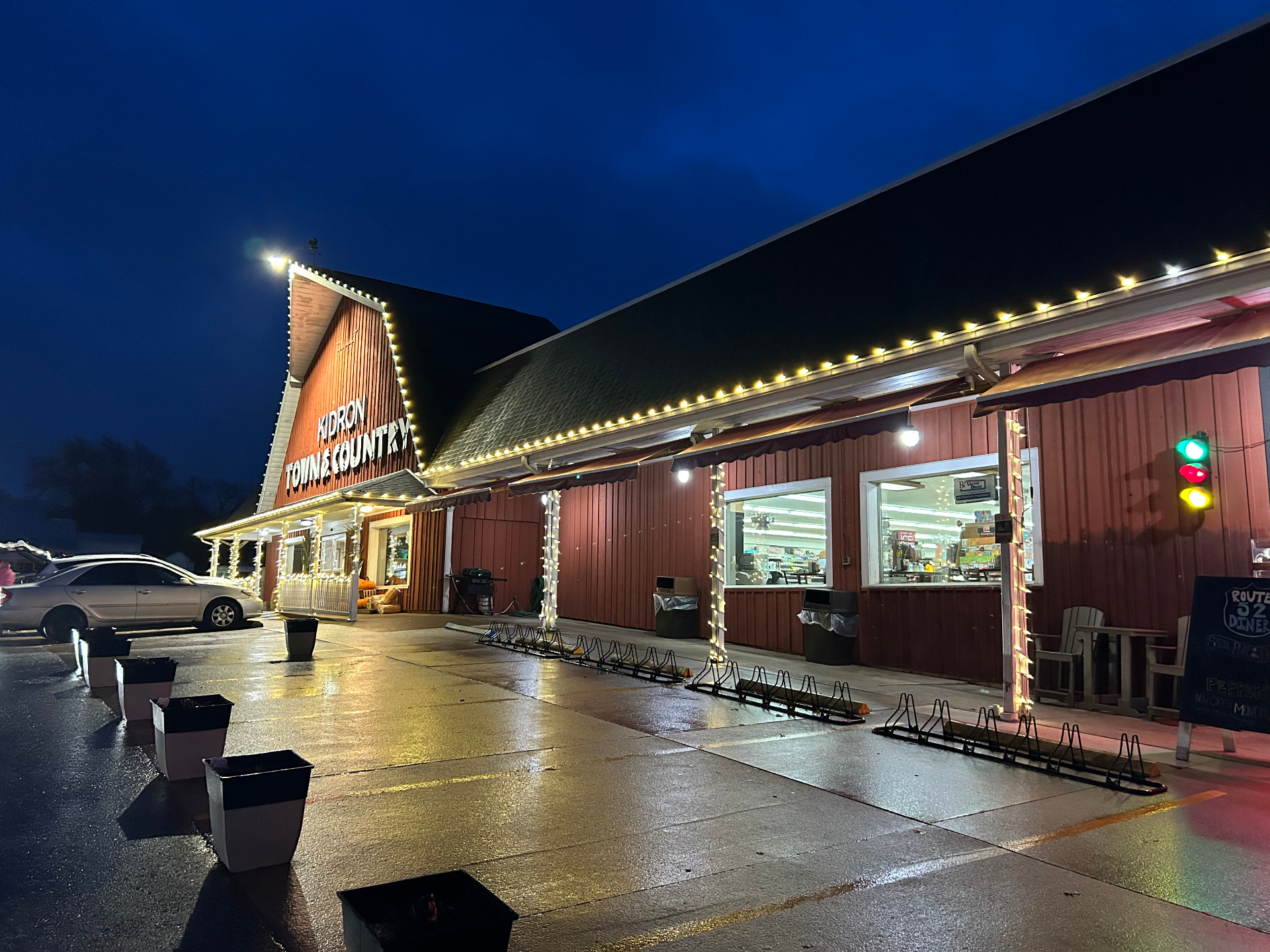 Commercial building with warm-white Christmas lights in winter